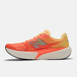 Tenis New Balance Hombre Running FuelCell Rebel V5 - Tangerine Heat/Silver Metallic