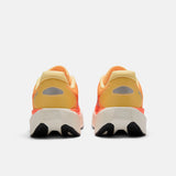 Tenis New Balance Hombre Running FuelCell Rebel V5 - Tangerine Heat/Silver Metallic