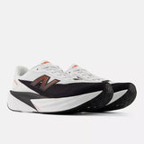 Tenis New Balance Hombre Running FuelCell Rebel V5 - White/Neo Flame