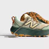 Tenis New Balance Mujer Trail - Hierro V9 - Calcium with Dark Juniper